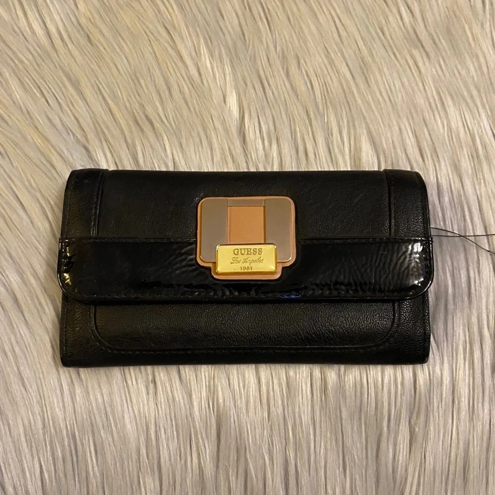 🆕 Guess Black with Tan Accent Buckle on Front Wallet